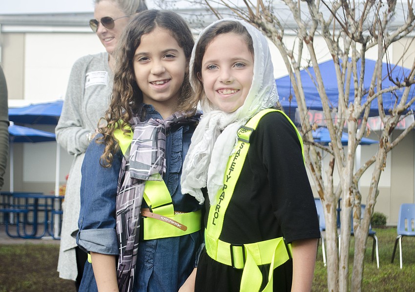 Mikayla Lucy and Malia Jones acted as Ellis Island officers.