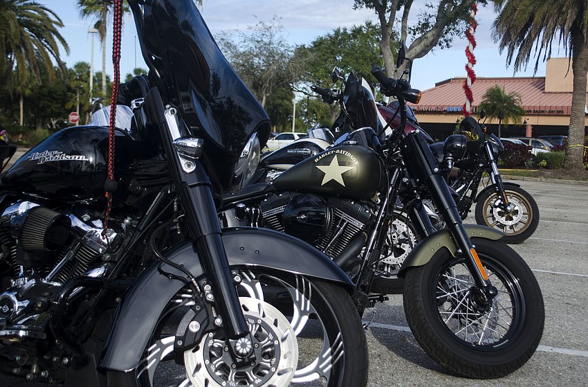 Motorcycles lined the parking lot outside the Coral House.