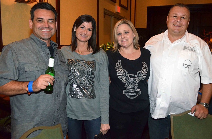 Carlos and Robin Garcia with Michelle and Andy Maleszka