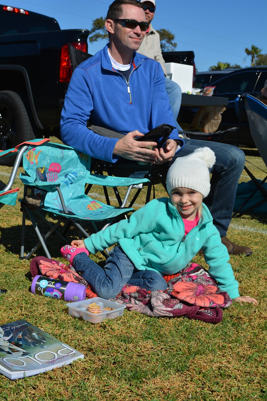 Emma Buffaloe, 3, of Nokomis came to her first polo match with her dad, Justin, and mom, Krista (not pictured.