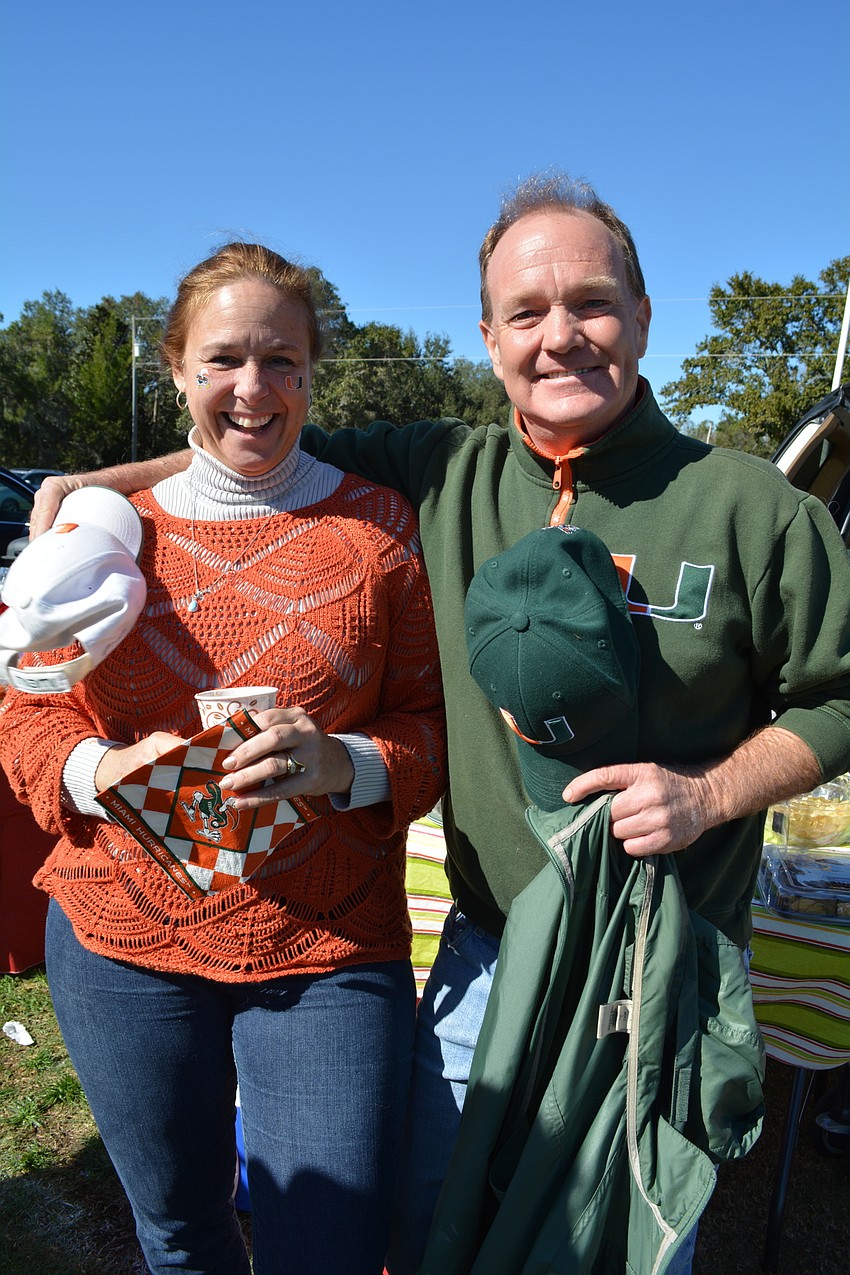 Summerfield residents Judy and Dana Hanson celebrated the University of Miami.