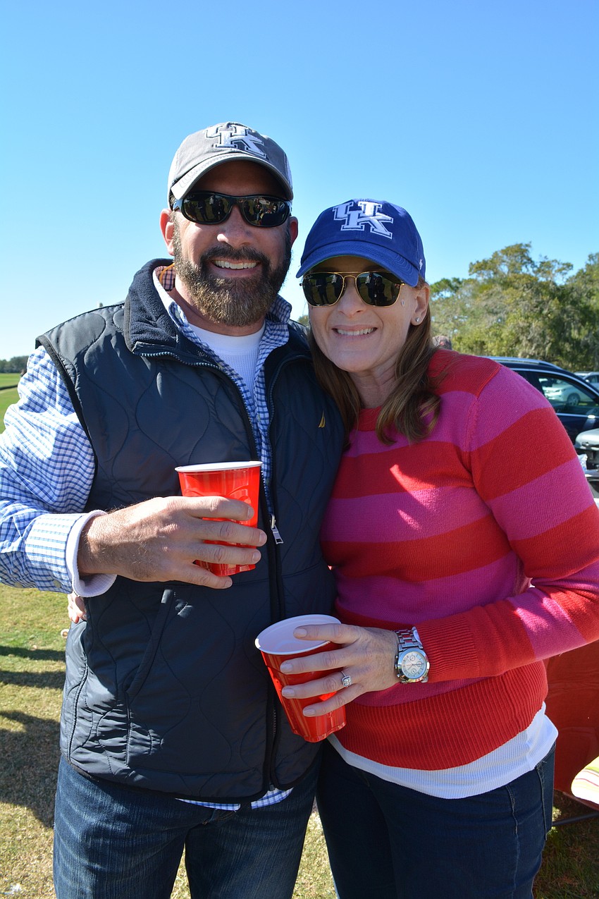 Jeff Ramsey and Michelle Arrazola, of Central Park, tailgated with friends.