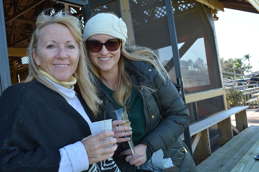 Veronica Murphy and Caitlin Verrinder, of Siesta Key, made sure to attend the first public match of the season because of the great weather.
