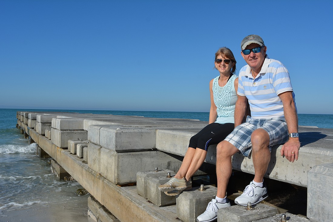 Cedars East owners Gill and Dave Hughes hope the groin adjustment slows the flow of sand on the north end.