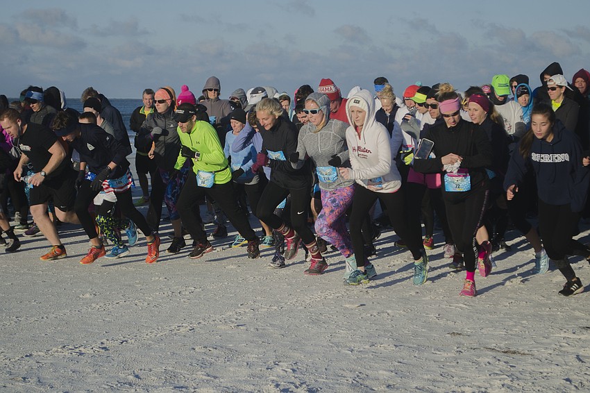 Runners begin the Andrew Monroe Memorial 5K.