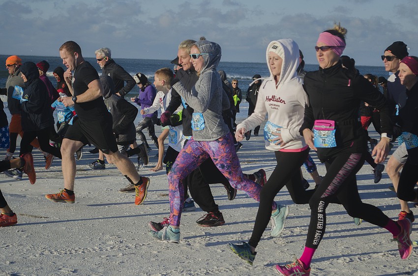Runners begin the Andrew Monroe Memorial 5K.