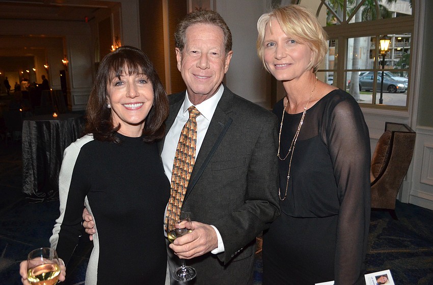 Steve and Pam Krouse with Teresa Wartgow