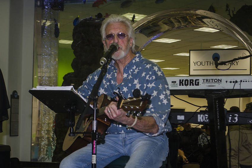 Jack Dowd performs during the Looking into the Crystal Ball fundraiser benefiting the Friends of Selby Library.