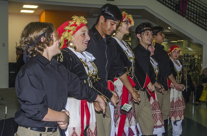 Ramsey Choueiri, Janna Choueiri, Peter Balos, Winona Nasser, Demetri Martins, Morgan Kirtlangitis, Christian Balos and Nicole Lykiardopulos of the St. Barbara Hellenic Fold Dancers perform during the event.