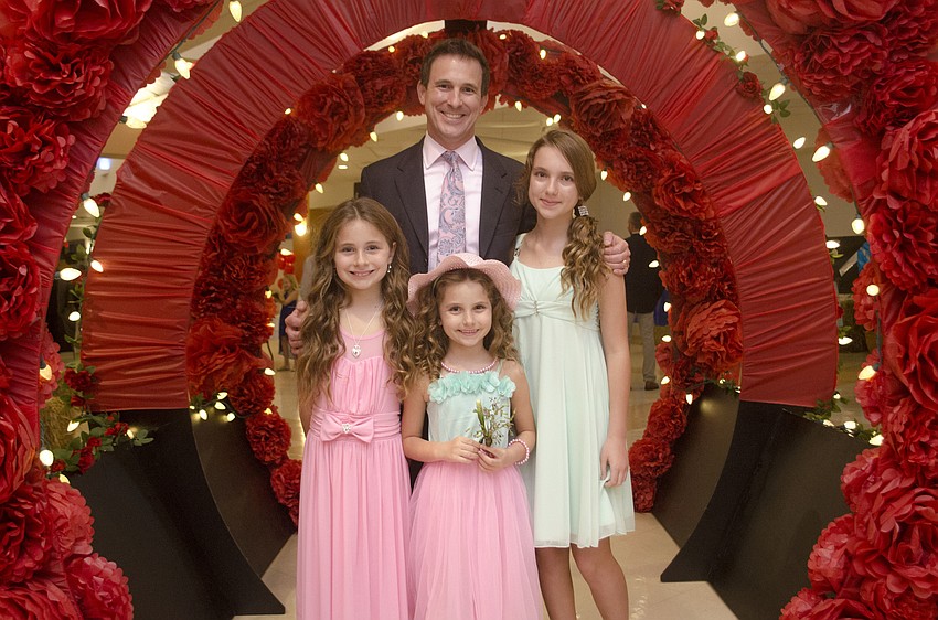 Greg Harrell with daughters Celeste, Theresa and Natalie Harrell