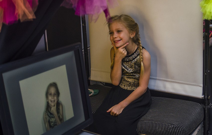 Hanna Hornung gets her photo taken in the photo booth.