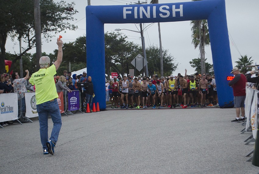 Runners line up at the starting line of the 14th annual Ringling Bridge Run.