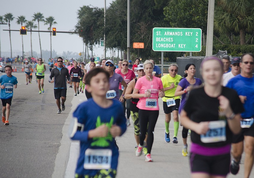 Participants of the 14th Annual Ringling Bridge Run near the turn onto Tamiami Trail.