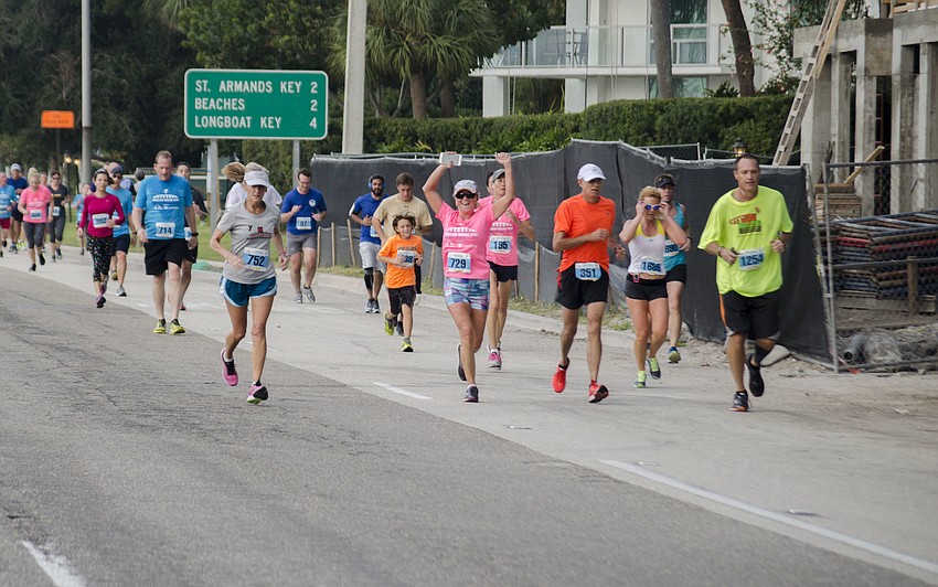 Participants of the 14th Annual Ringling Bridge Run near the turn onto Tamiami Trail.