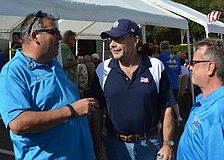 Elks Exalted Ruler Darrin Simone talks with new member Jim Williamson and current member John Piper at the open house.