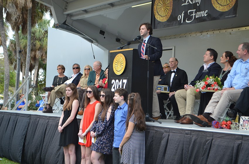 Allen Bloom’s grandson Benjamin Bloom speaks while his cousins stand beneath him.