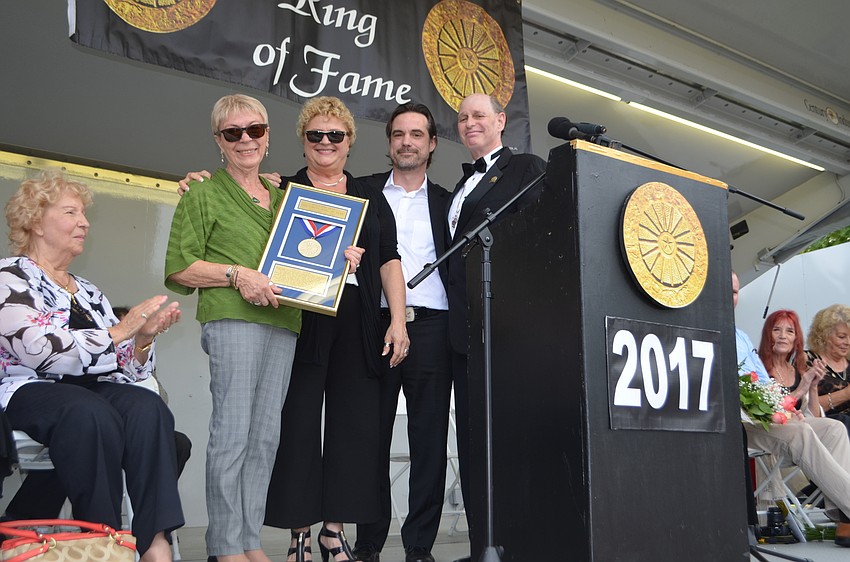 Bonnie Armor, with her children SaSa Armor and Reggie Armor, accepts her late husband’s place in the Circus Ring of Fame.