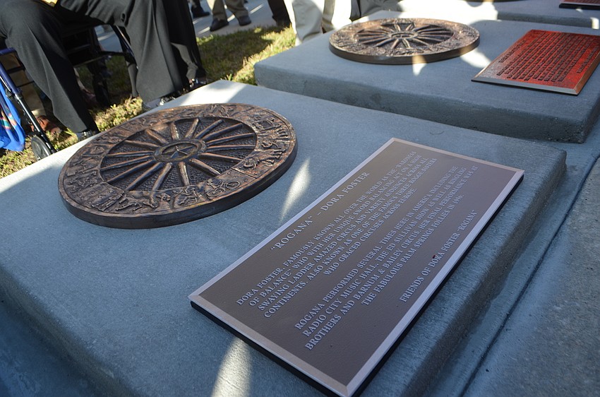 John Esola constructs the bases and mounts the bronze wheels and plaques for each inductee. The plaques are placed around St. Armands Circle Park.