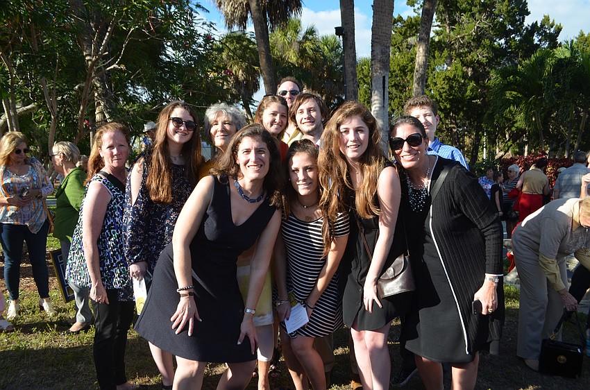Allen Bloom’s family is all smiles after unveiling his plaque.