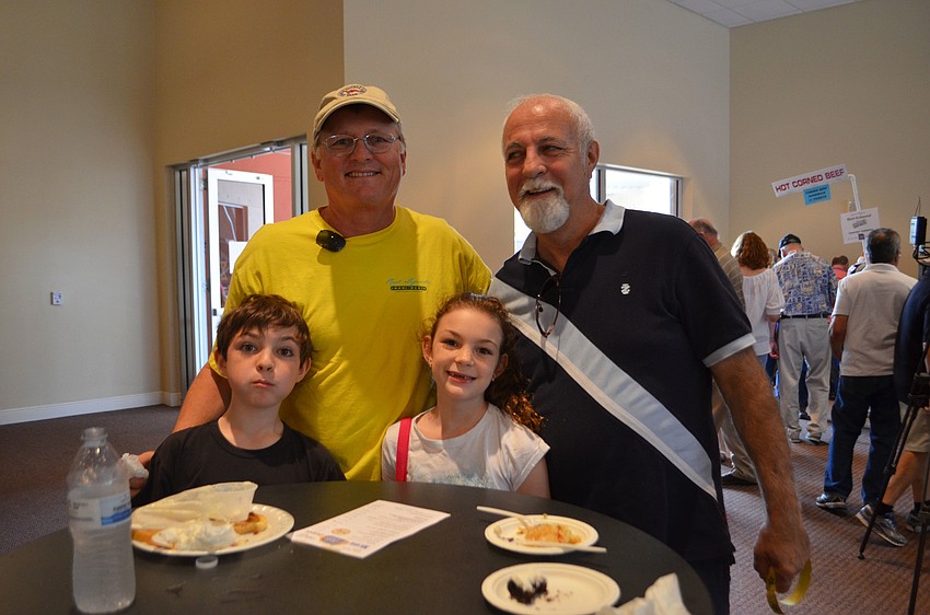 Sam Smith, 9, Dan Hess, Sarah Smith, 7, and Jeff Smith