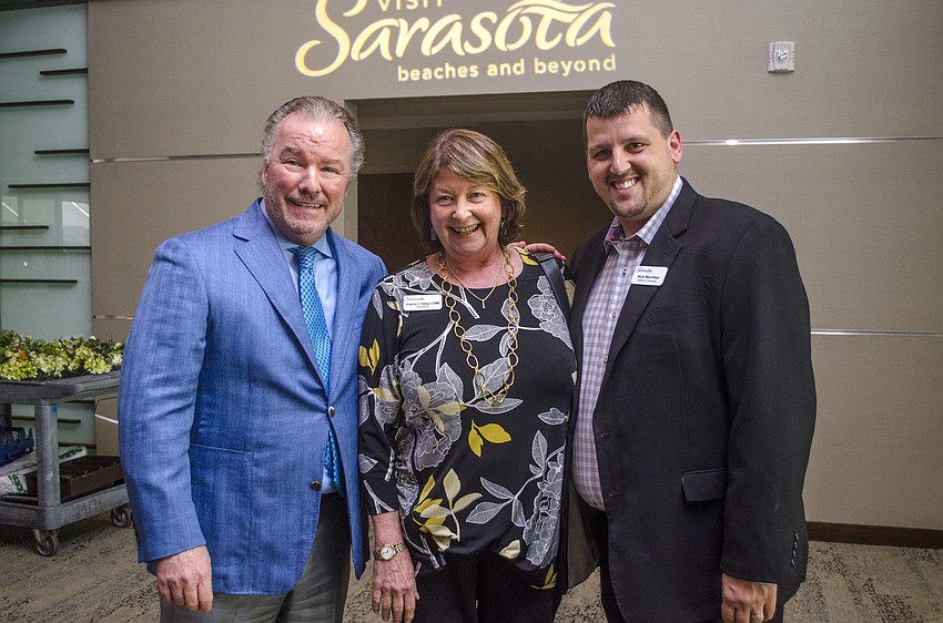 Visit Sarasota County Board of Directors Past Chairman Michael Klauber, Visit Sarasota County President Virginia Haley and Visit Sarasota County board member Nick Mavrikas