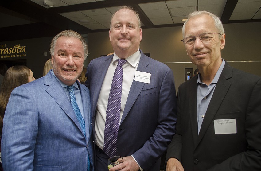 Visit Sarasota County Board of Directors Past Chairman Michael Klauber, Visit Sarasota County Board of Directors Chairman Drayton Saunders and Visit Sarasota County Board of Directors Secretary Steven High