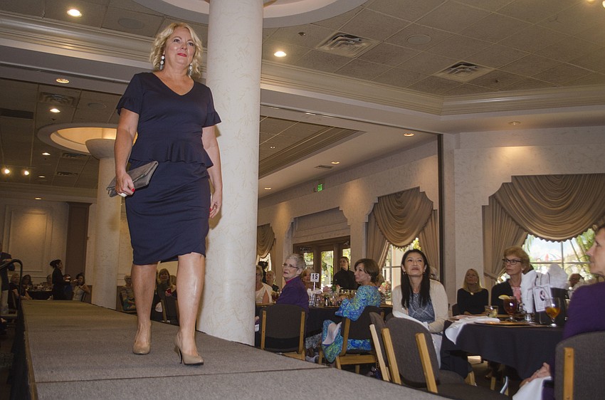 Jody Weniger walks the runway at the Garden Club Fashion Show.