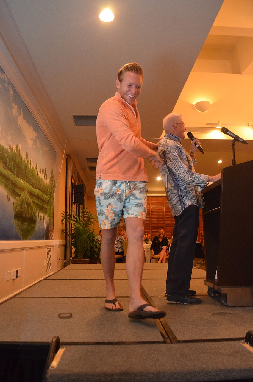 Michael Long models casual beachwear from Tommy Bahama during the 6th annual Taste of the Keys and Fashion Show.