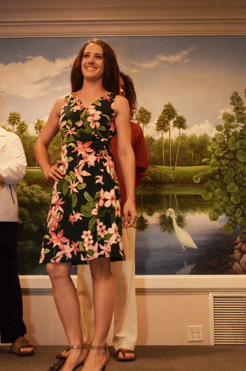 two outfits each. One was casual and one was a little dressier. 
199. Jamie Schindewolfe models during the 6th annual Taste of the Keys and Fashion Show. Models wore two outfits each. One was casual and one was a little dressier.