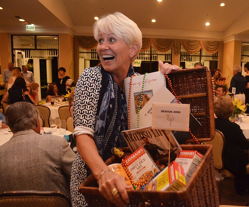 Meike Dooley won the grand prize in the $100 raffle. She won three nights in the New Orleans French Quarter Collection hotel with landmark dining experiences and private guided tours.