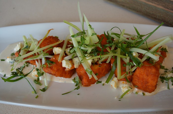 Spicy Buffalo cauliflower is just one of California Pizza Kitchen'  s non-pizza offerings. The restaurant opens in Sarasota on Monday.