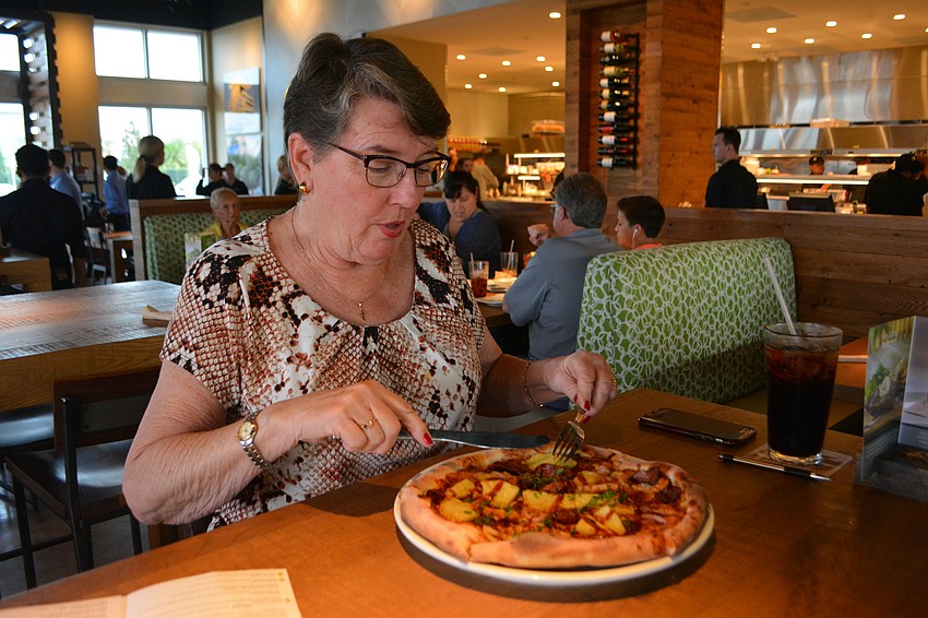 Linda Sheffer of Sarasota was invited to the Sneak Peak event and enjoyed a BBQ chicken pizza with bacon.