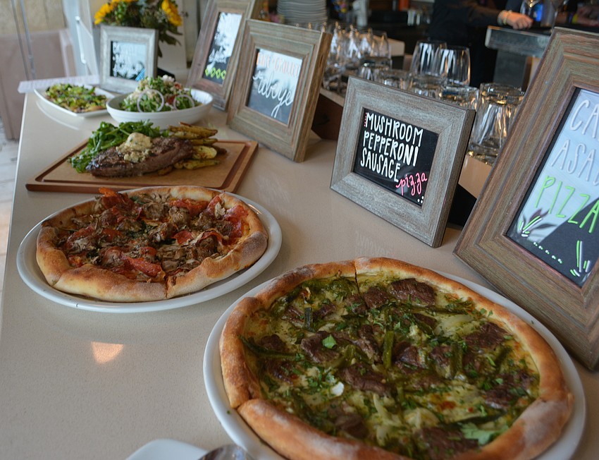 Various food items were on display during the Sneak Peak. The restaurant opens Monday at 11 a.m.