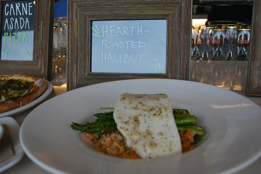 Pizza makes up 26% of the chain'  s business, but items such as hearth-roasted halibut gives patrons healthy options.