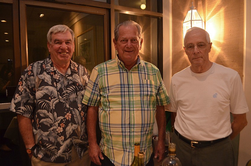 Bartenders Dan Linehan, Keith O’Connor and Charlie Gieger