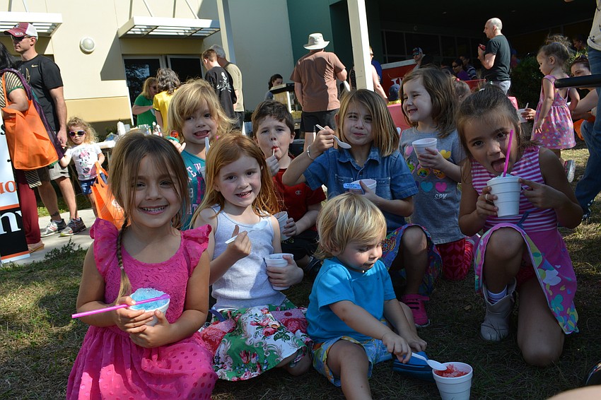 This clans of snow-cone eaters are all neighborhood friends. First row: Carly Guido, Emeline Korenman and Elliot Korenman. Back row: Marley Hill, Elijah McNeal, Layla Korenman, Jaclynn McNeal and Stella Guido.