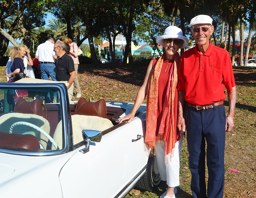 Barbara and Bob Swan stand with their 1971 280SL Mercedes.