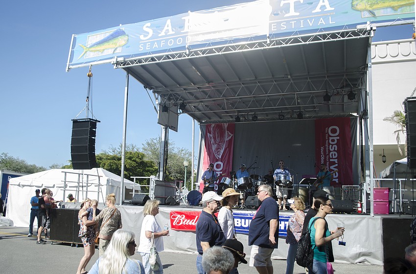 Guests mingled near the main stage during the Sarasota Seafood and Music Festival.