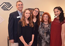 David Auxier, director of career development for Boys & Girls Clubs of Sarasota County, with  Boys & Girls Clubs of Sarasota County members Christina Polokonis and Kat Barbieri with Cheri Pachter and club member Fatima Demlak