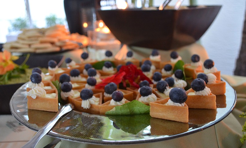Several hors d’oeuvres such as these key lime tarts were made by Chef Mara Cristiani and her team at Laurel Oak Country Club.