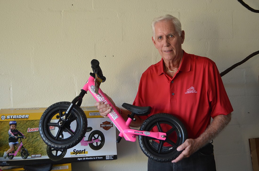 John Tendall donated 10 Strider bikes to Children First over the holidays.