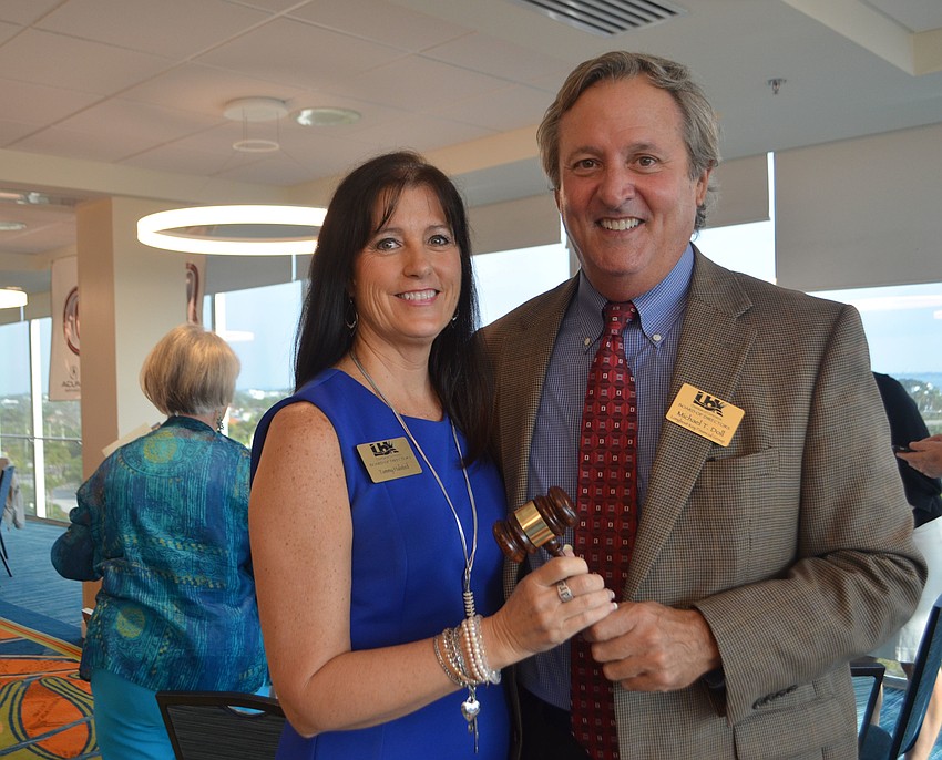 Outgoing 2016 Chamber Chairwoman Tammy Halsted and and incoming 2017 Chamber Chairman Michael Doll