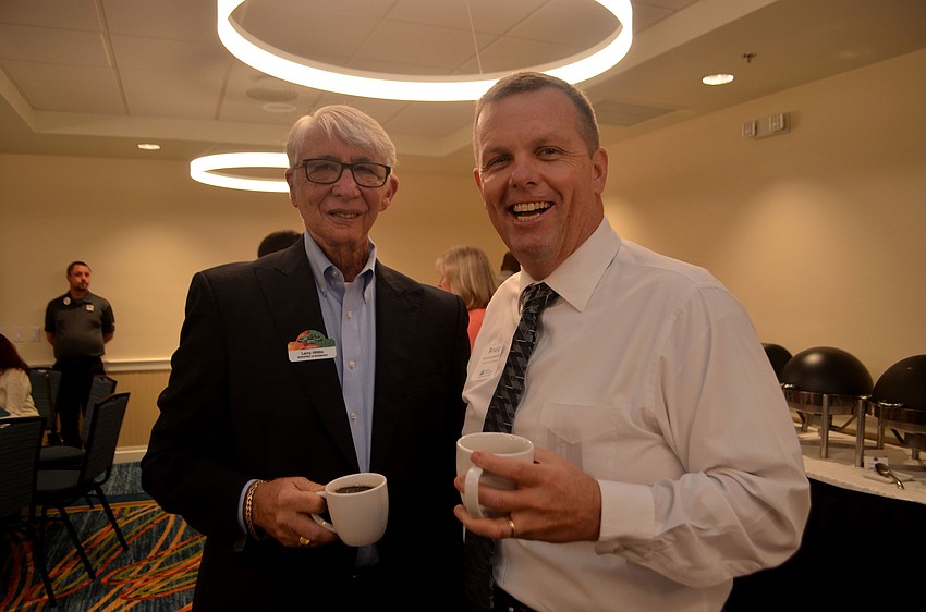 Larry Hibbs of ServPro Bradenton and Bruno Kapacinskas of Manatee County Government