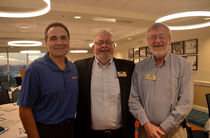 Bill Konkol of SPT, Jack Dean of Montgomery Carpets Plus and Ed Nugent of Cornerstone