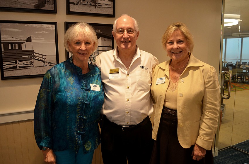 Peg Pluto, Dennis Hassell and chamber President Gail Loefgren