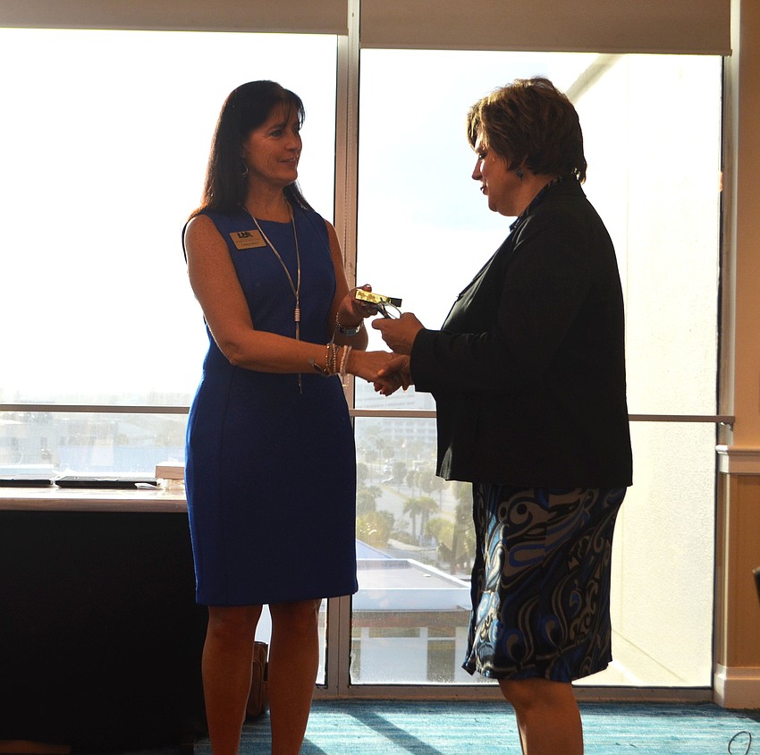 Sherrill Sokol accepts her “Good as Gold” award.