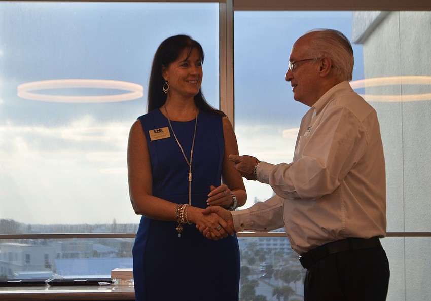 Dennis Hassell accepts his “Good as Gold” award.