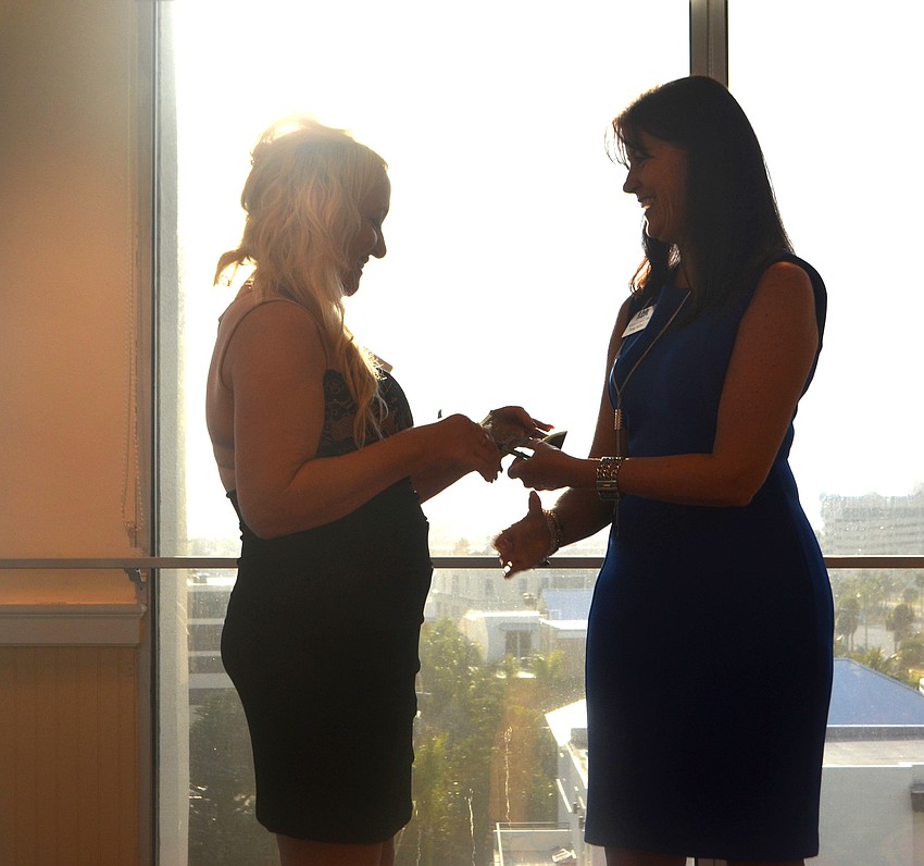 Penelope Mabry accepts the award for “Norm Mallard Ambassador of the Year.”