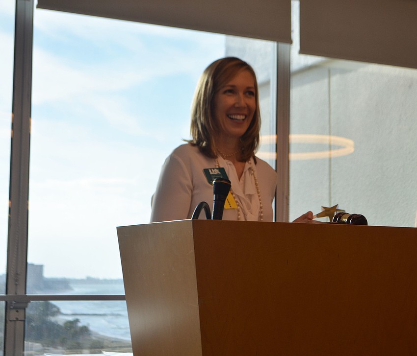Sherri Mills speaks to the crowd after accepting the  “Member of the Year” award.