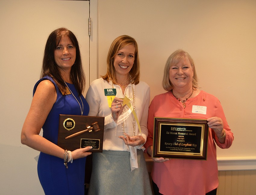 2016 Chamber Chairwoman Tammy Halsted, 2016 Member of the Year Sherri Mills and Ed Moran Memorial Award winner Carol Erker on behalf of the Longboat Key Rotary Club